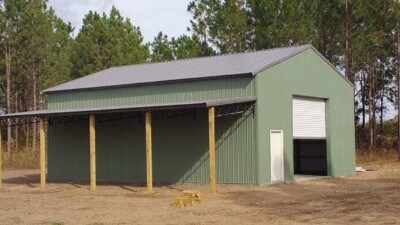 Metal-walled shed with granite-colored metal roofing