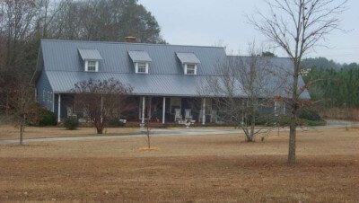 Bluish-grey house with granite rib roofing