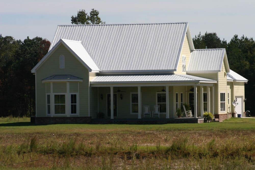 Durable and energy-efficient metal roof panels on a modern home